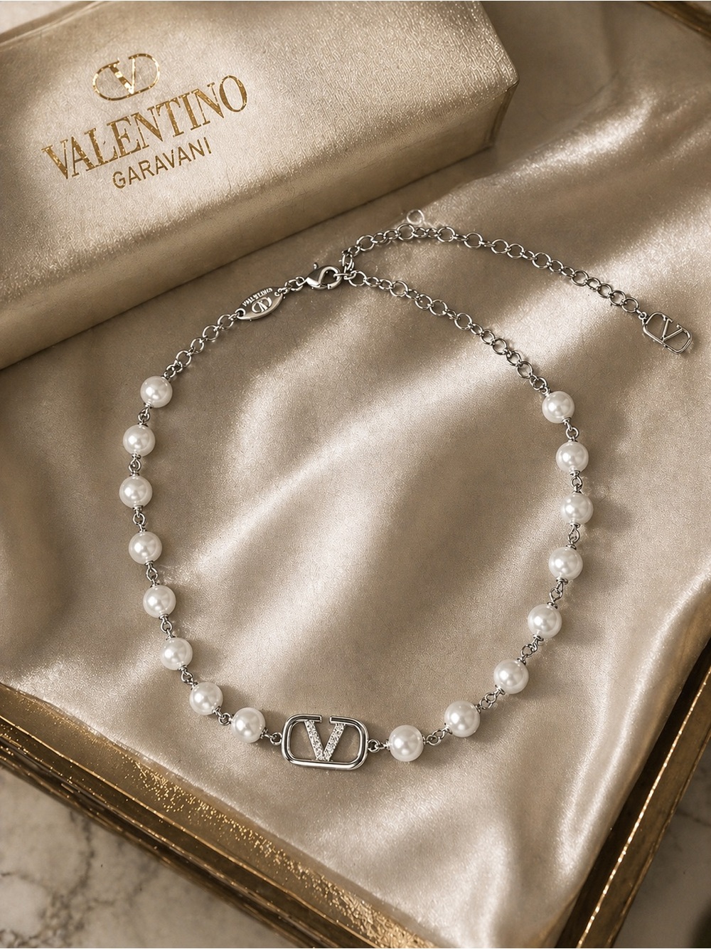 Silver and White Pearl Valentino V-Emblem Necklace - Picture 3 of 11
